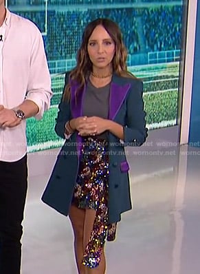 Lilliana’s green and purple contrast blazer and sequin skirt on E! News