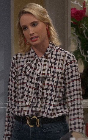 Mandy's checked tie neck blouse on Last Man Standing