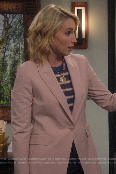 Mandy's pink blazer and blue striped sweater on Last Man Standing