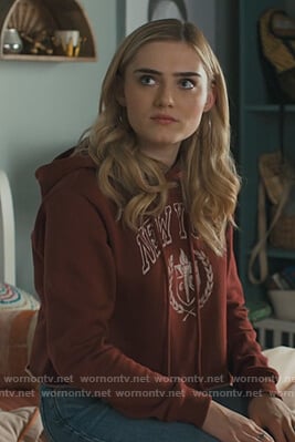 Taylor's red cropped New York graphic hoodie on American Housewife