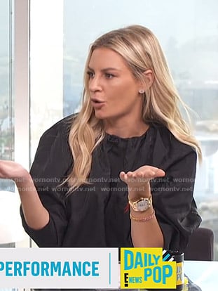 Morgan’s black gathered neck blouse on E! News Nightly Pop