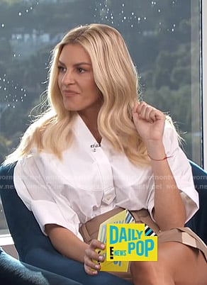 Morgan’s white elbow length sleeve shirt and beige shorts on E! News Daily Pop