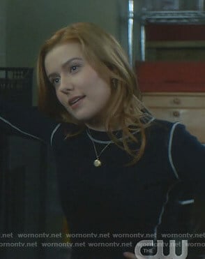 Nancy's navy sweater with white stitching on Nancy Drew