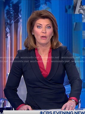 Norah's black buttoned wrap blazer on CBS Evening News