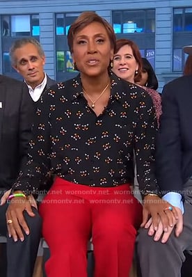 Robin’s black mickey mouse print blouse and red pants on Good Morning America