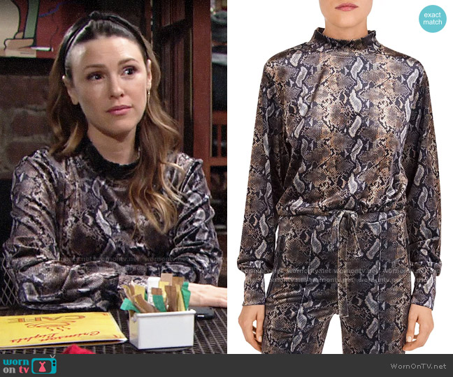 WornOnTV: Chloe’s snake print top on The Young and the Restless
