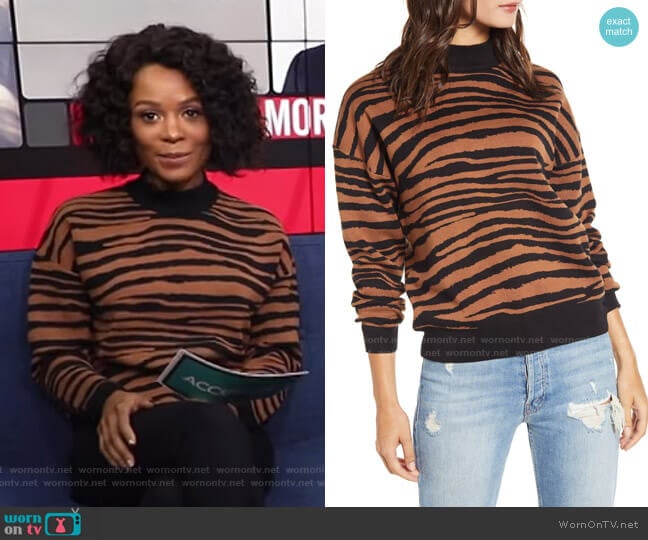 Vincent Tiger Print Mock Neck Sweater by WAYF worn by Zuri Hall on Access Hollywood