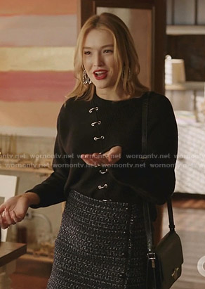 Kirby's black grommet sweater and tweed mini skirt on Dynasty
