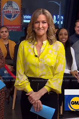 Lara’s yellow floral blouse and zip front skirt on Good Morning America