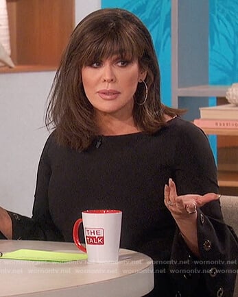 Marie's black grommet bell sleeve top on The Talk