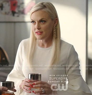 Alexis’s white bell sleeve dress on Dynasty