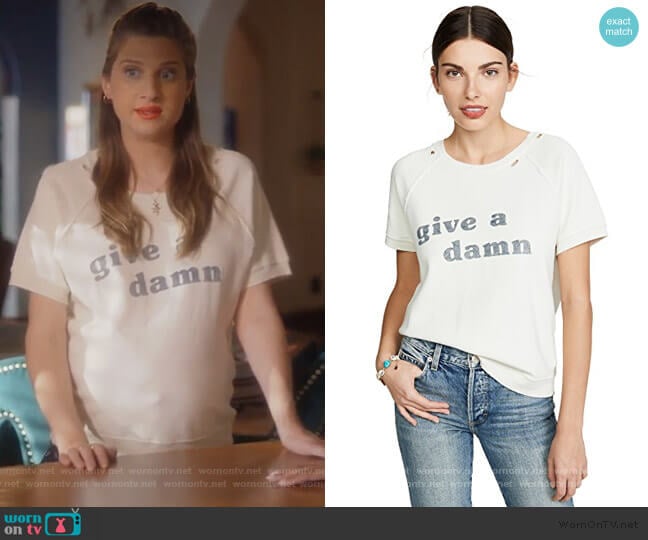 Give A Damn Short Sleeve Sweatshirt by AMO worn by Nomi Segal (Emily Arlook) on Grown-ish