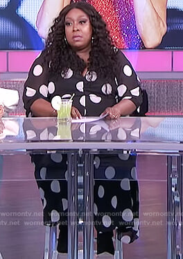 Loni’s black polka dot jumpsuit on The Real