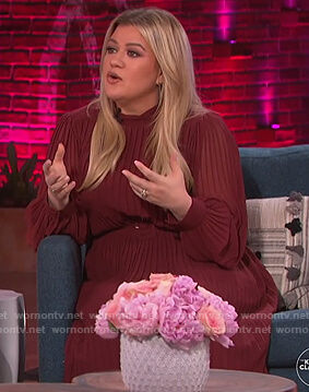 Kelly’s burgundy pleated midi dress on The Kelly Clarkson Show