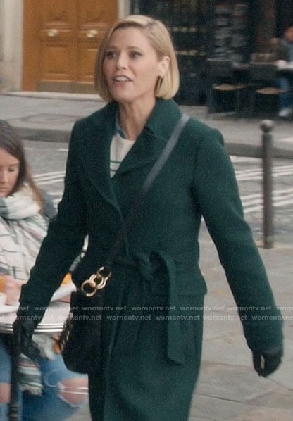 Claire's green coat in Paris on Modern Family
