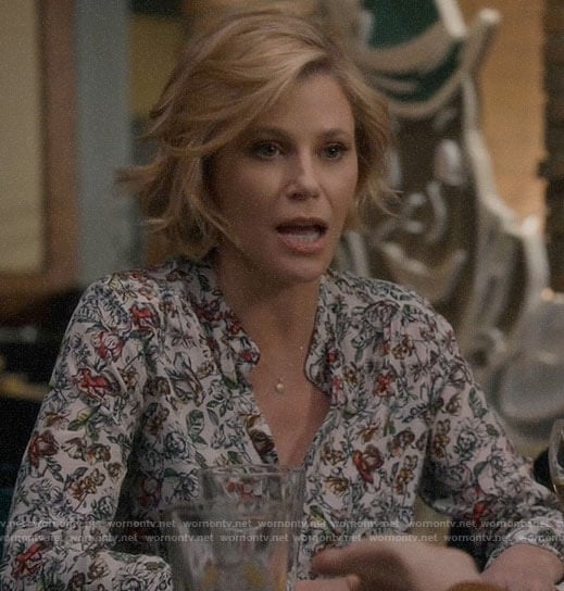Claire's white floral blouse on Modern Family