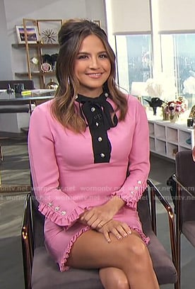 Erin’s pink tie neck dress with pearl buttons on E! News