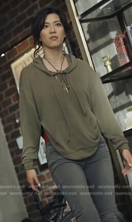 Grace's green hoodie with back cutout on Black Lightning