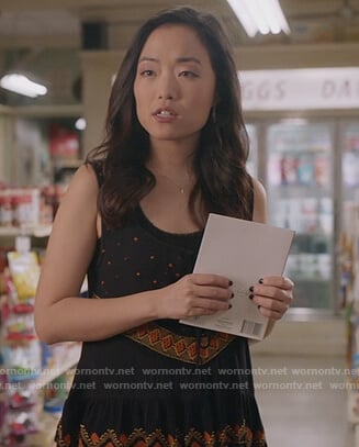 Janet’s black embroidered tank on Kims Convenience