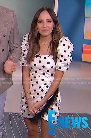 Lilliana’s white polka dot puff-sleeve mini dress on E! News