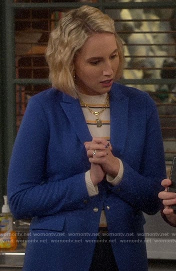 Mandy’s striped sweater and blue blazer on Last Man Standing