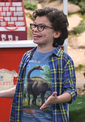 Matteo's blue dinosaur print tee and plaid shirt on Bunkd