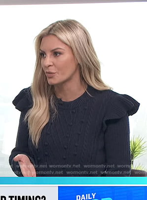 Morgan’s navy ruffle shoulder sweater on E! News Daily Pop