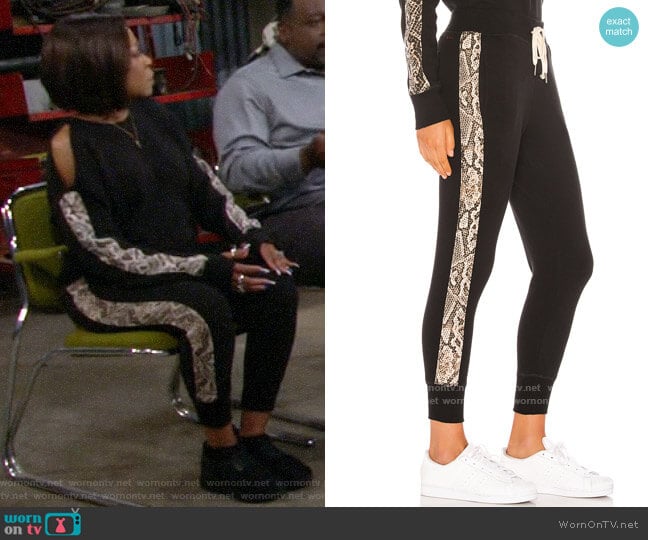 n:Philanthropy Barkley Jogger in Sand Python worn by Tina Butler (Tichina Arnold) on The Neighborhood