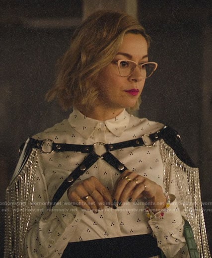 Pepper's white dotted shirt and fringed harness on Katy Keene