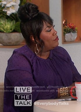 Sheryl’s purple dotted blouse on The Talk