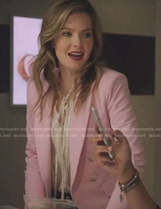 Sutton's tie neck blouse and pink blazer on The Bold Type