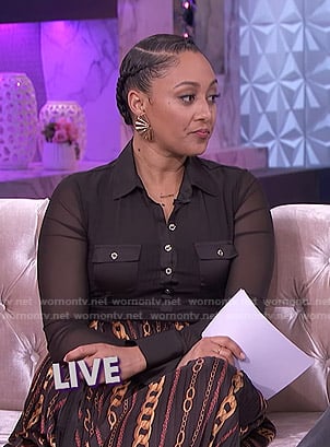 Tamera's black mesh button down top and chain print skirt on The Real