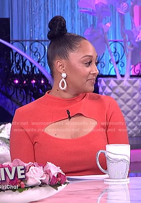 Tamera's orange cutout top and tie dye skirt on The Real