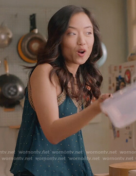 Janet's teal embroidered tank on Kims Convenience