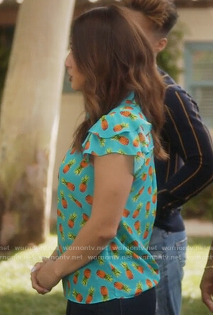 Ana's turquoise pineapple print top on Grown-ish