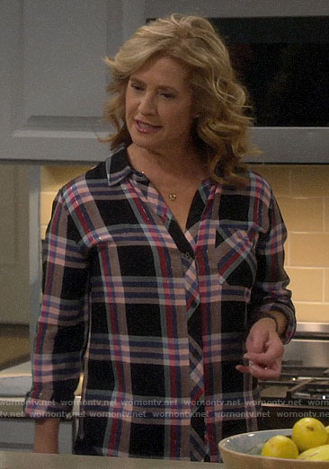 Vanessa’s black and pink plaid shirt on Last Man Standing