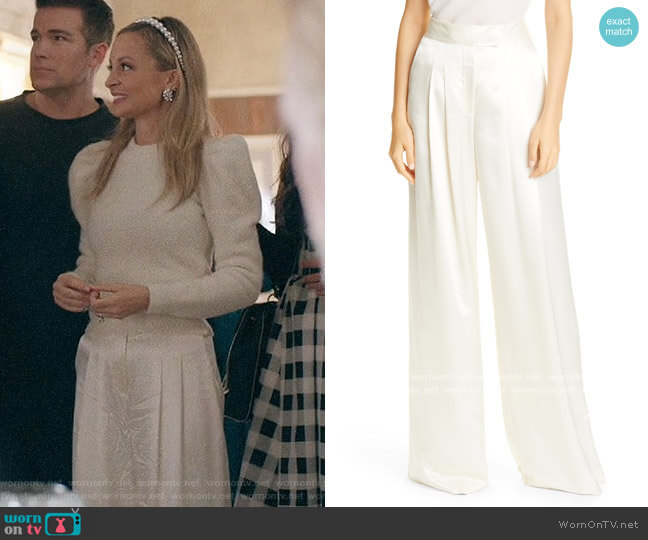 Sierra’s white pleated pants on Bless This Mess