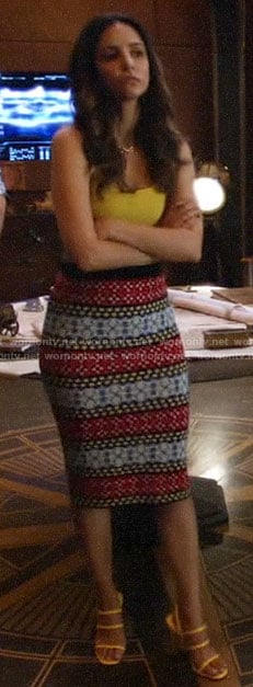 Zari's yellow crop top and patterned stripe skirt on Legends of Tomorrow
