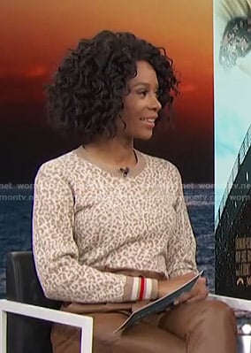 Zuri's white and beige leopard sweater on Access Hollywood