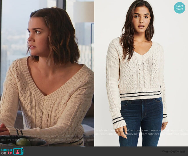 Cropped Cable V-neck Sweater by Abercrombie & Finch worn by Callie Foster (Maia Mitchell) on Good Trouble