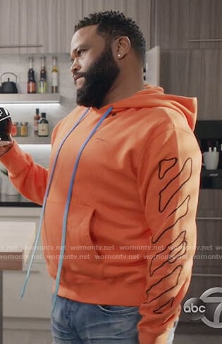 Andre's orange printed hoodie on Black-ish