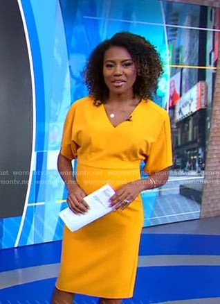 Janai’s orange v-neck dress on Good Morning America