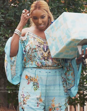 Nene’s turquoise printed cold shoulder top and pants on The Real Housewives of Atlanta