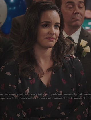 Amy's black floral v-neck dress on Brooklyn Nine-Nine