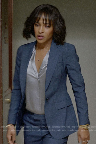 Edie's blue suit and silver blouse on Almost Family