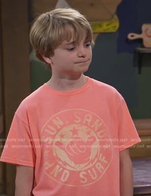 Finn’s orange surf graphic tee on Bunkd