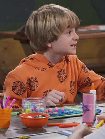 Finn’s orange tiger print sweatshirt on Bunkd