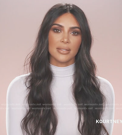 Kim's white turtleneck top on Keeping Up with the Kardashians