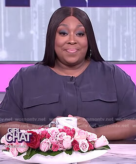 Loni’s navy utility jumpsuit on The Real