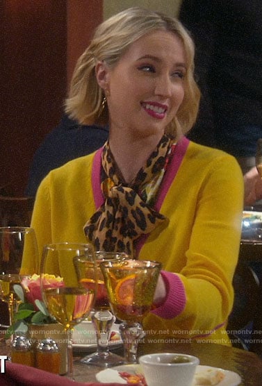 Mandy's yellow cardigan with pink trim and leopard blouse on Last Man Standing